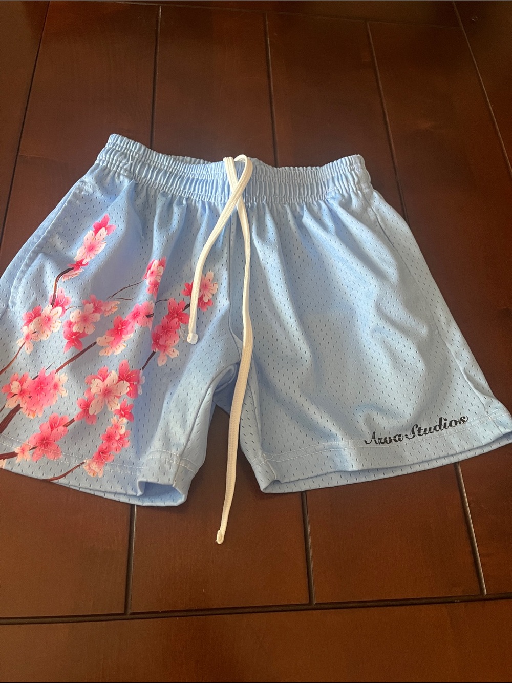 Fashion Nova Light Blue Athletic Shorts with Pink Floral Print